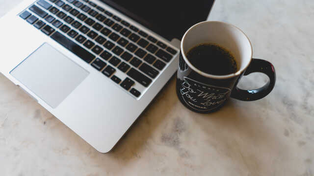Image of laptop and coffee cup